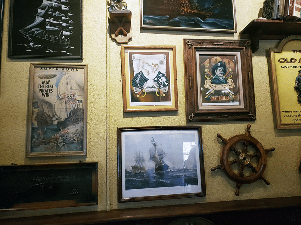 Artifacts & Artwork on the Wall at Gaspar's Grotto in Tampa, FL