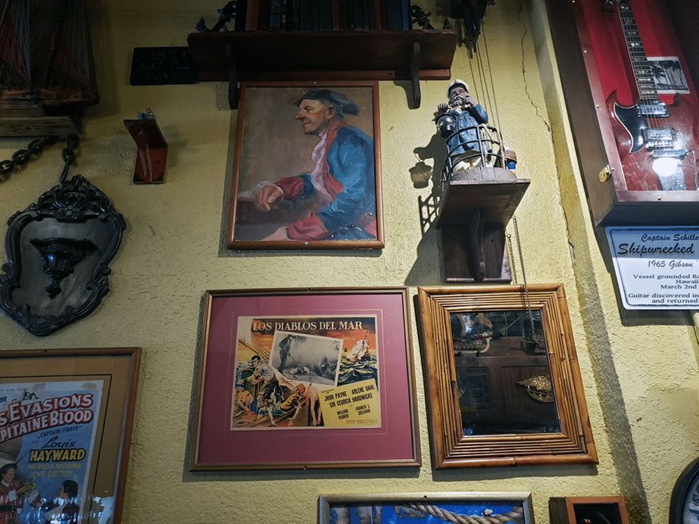 Artifacts & Artwork on the Wall at Gaspar's Grotto in Tampa, FL